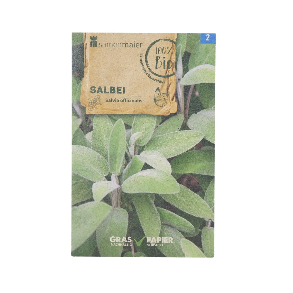 Eine Graspapierverpackung mit BIO-Saatgut Salbei zeigt lebendige grüne Salbeiblätter, beschriftet mit „Salbei“ und dem wissenschaftlichen Namen Salvia officinalis, ideal für eine Bienenweide.