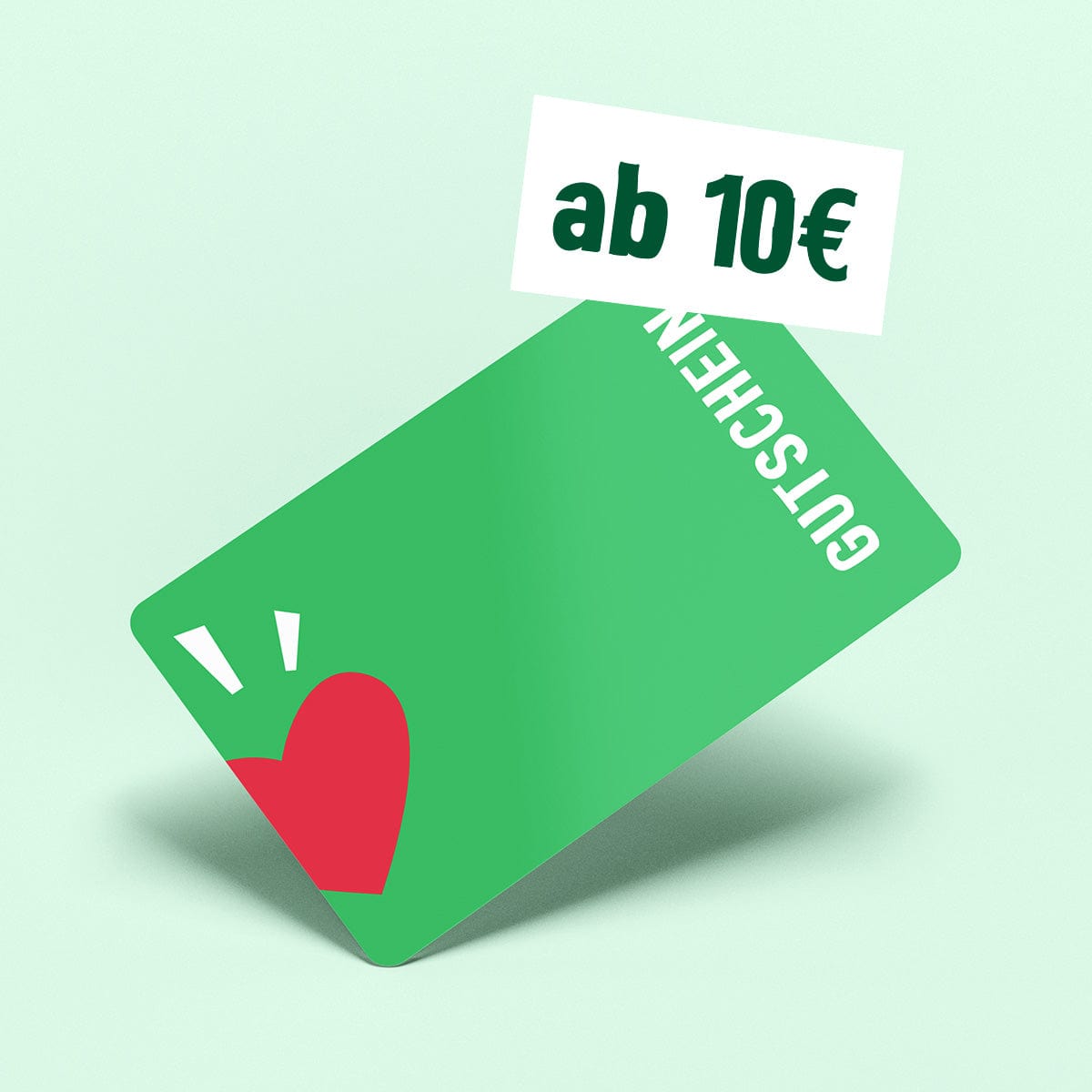 Grüne Geschenkkarte mit rotem Herz und „SIRPLUS Gutschein“ auf hellgrünem Hintergrund. Erhältlich ab 10€, perfekt für umweltbewusste Käufer in unserem Onlineshop oder die fürsorglichen Retterheld:innen in Deinem Leben.